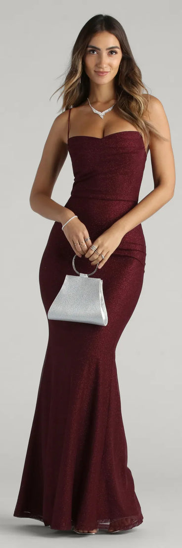 Shimmer through every feed refresh in the Addison Glitter Mesh Formal Dress, a viral-worthy look from Windsor's wine prom dresses that nails bold, confident energy.