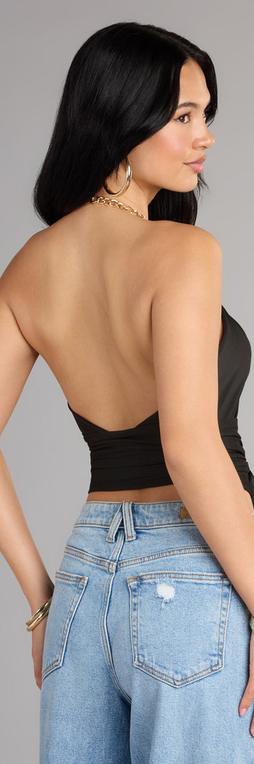 Show off your style in the Chain Reaction Wrap Halter Top, a crop top designed for bold looks and effortless versatility.