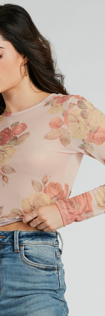 With fun and flirty details, the Elevate The Charm Long Sleeve Floral Mesh Crop Top shows off your unique style for a trendy outfit for summer!