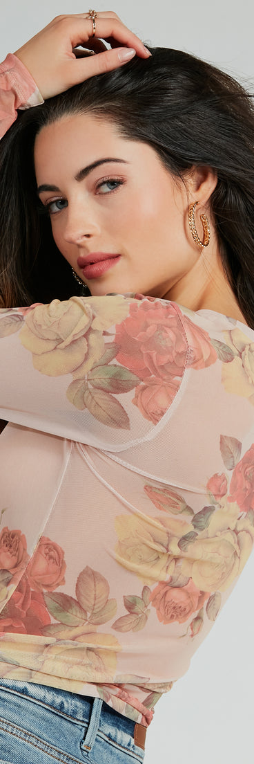 With fun and flirty details, the Elevate The Charm Long Sleeve Floral Mesh Crop Top shows off your unique style for a trendy outfit for summer!
