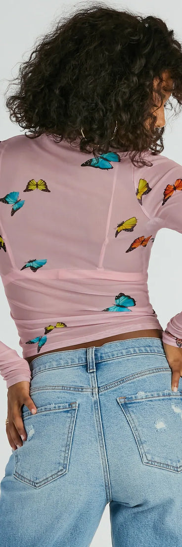 Essential for your seasonal closet, the Butterfly Effect Long Sleeve Mesh Crop Top offers a trendy twist on everyday tops so you can elevate your style effortlessly.