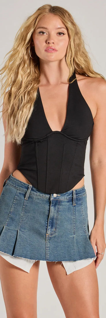 Show off your style in the Sleek And Stunning Corset Halter Top, a black crop top designed for bold looks and effortless versatility.
