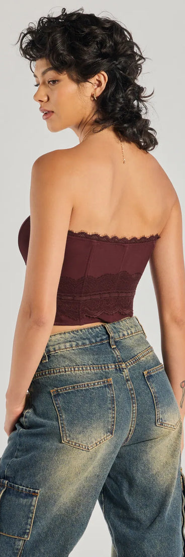 The waist-defining bodice style of the Chic Attitude Lace Trim Mesh Corset Top in wine is perfect for making a statement with your outfit and provides the structure, molded cups, or lace-up details that capture the corset trend.