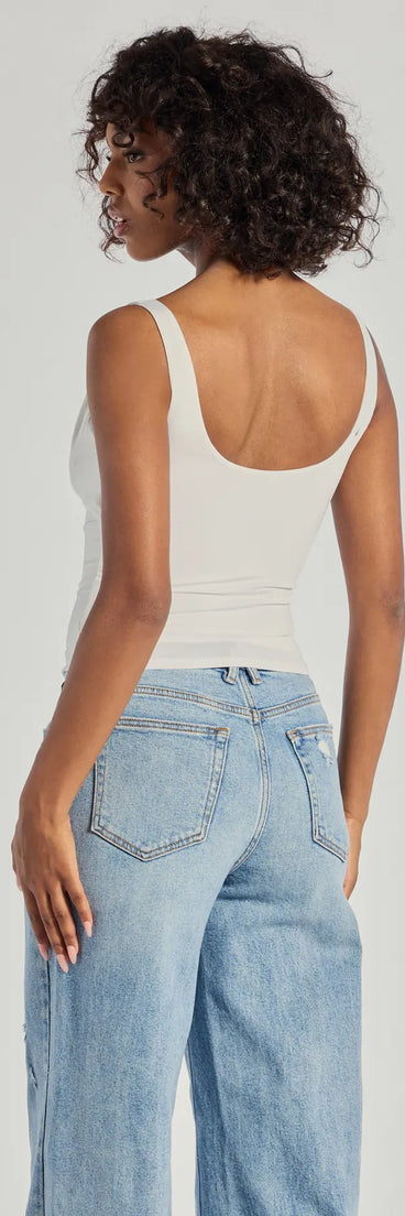 Upgrade your style game for 2025 with the Glam Flair Sleeveless Cowl Neck Top in ivory, perfect for any fashion-forward wardrobe.