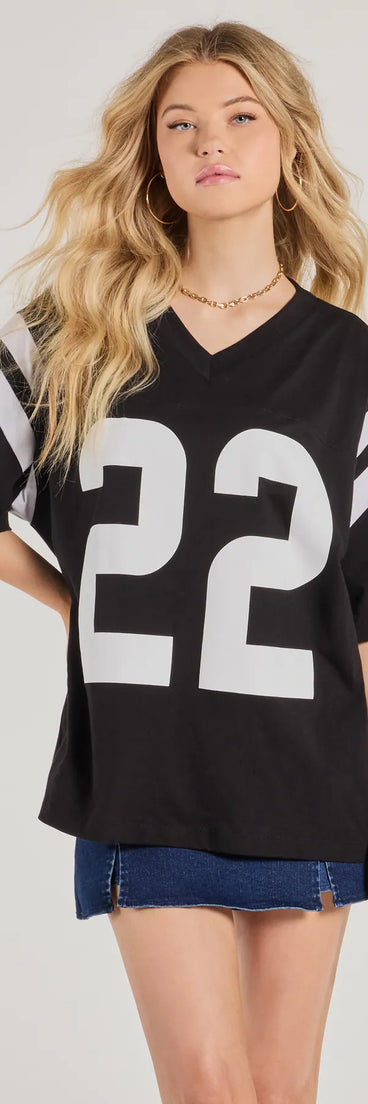The 22 Oversized Graphic Tee in black with a modern design and trendy look is part of the latest women's tops collection to elevate your 2025 wardrobe.