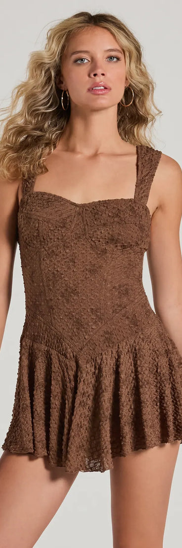 The Ain't It Cute Sweetheart Ruffled Skater Romper brings edge and energy to your vibe, ready to elevate any festival look or concert outfit.